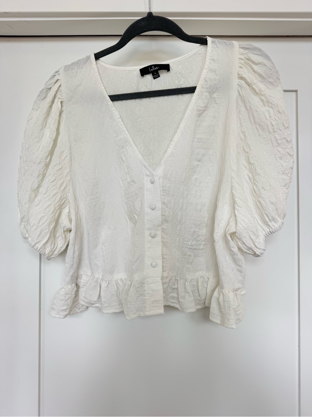 Lulu's Ivory Textured V-Neck Puff-Sleeve Peplum Blouse